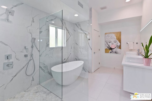 bathroom featuring vanity, separate shower and tub, and tile patterned flooring