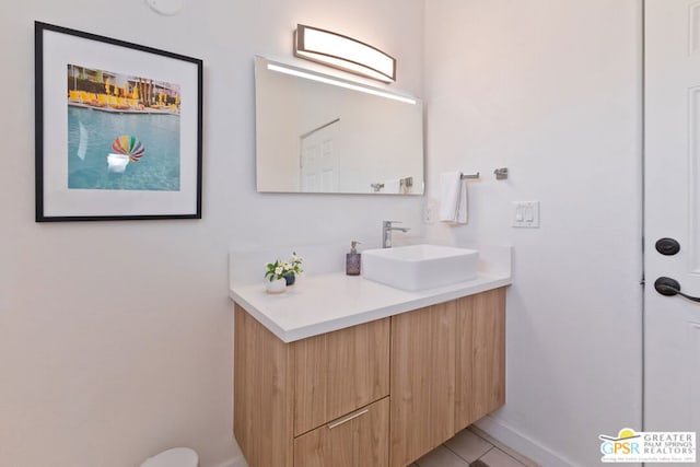 bathroom featuring vanity and tile patterned flooring