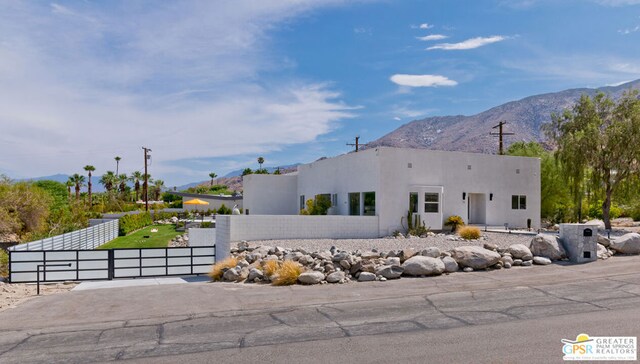 view of front facade featuring a mountain view