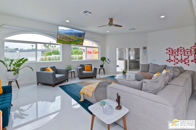 living room featuring ceiling fan