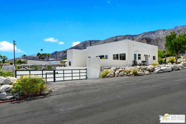 view of front of home with a mountain view