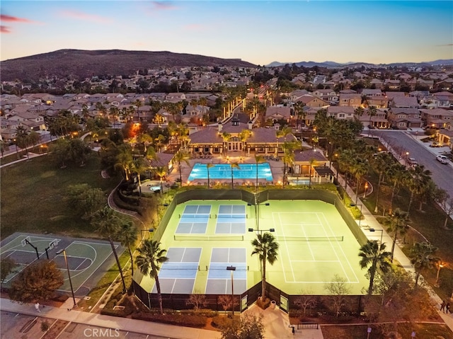 aerial view at dusk with a mountain view