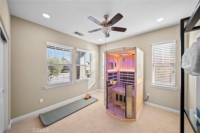 carpeted bedroom featuring ceiling fan