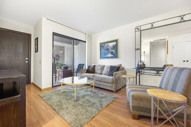 living room featuring light hardwood / wood-style floors