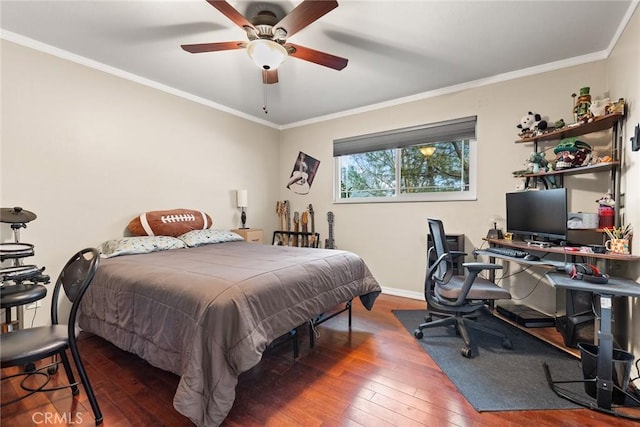 bedroom with crown molding, hardwood / wood-style flooring, and ceiling fan