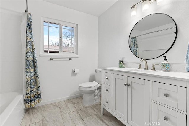 full bathroom with vanity, shower / bath combo, and toilet