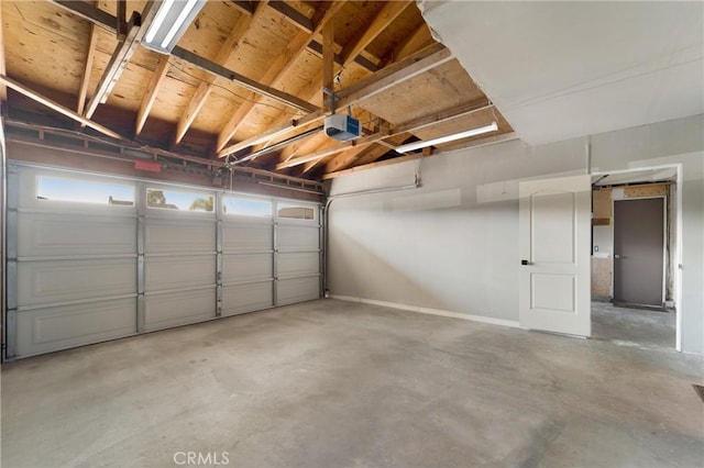 garage featuring a garage door opener