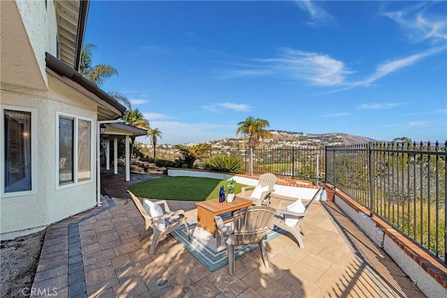 view of patio featuring a mountain view