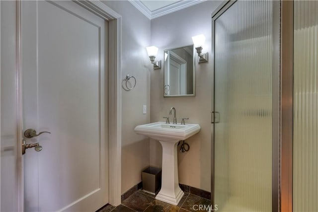 bathroom with crown molding, tile patterned floors, and a shower with shower door