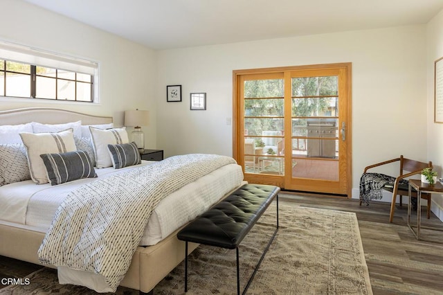 bedroom featuring dark hardwood / wood-style flooring