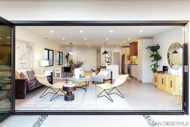 living room featuring sink