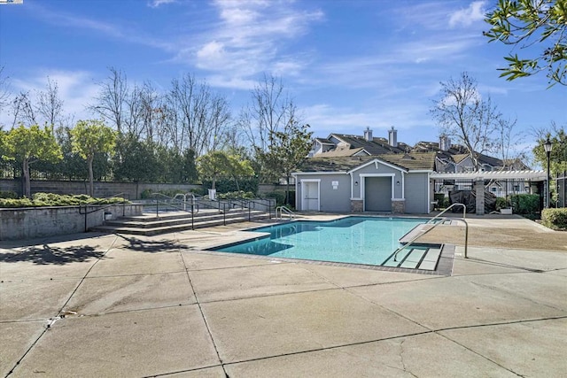 view of pool featuring a pergola and a patio area