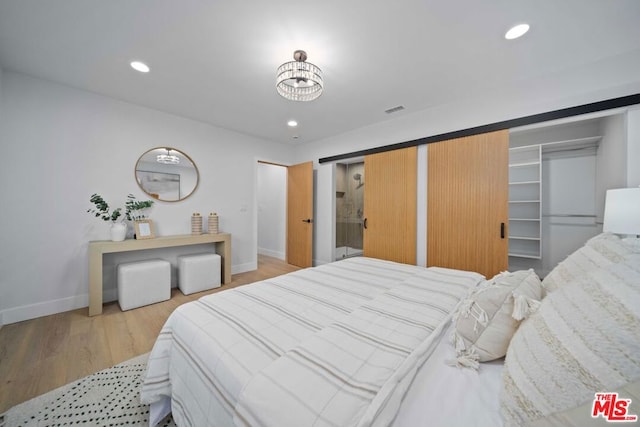 bedroom featuring hardwood / wood-style floors