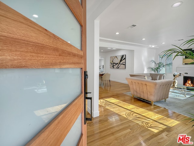 corridor featuring light hardwood / wood-style flooring