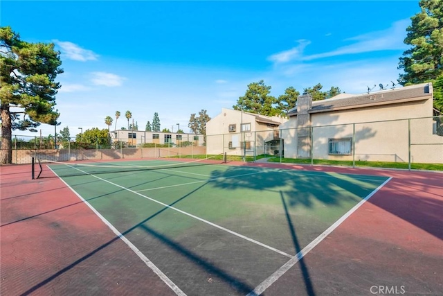 view of sport court with basketball hoop