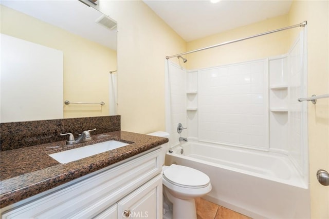 full bathroom with shower / bathtub combination, vanity, toilet, and tile patterned floors