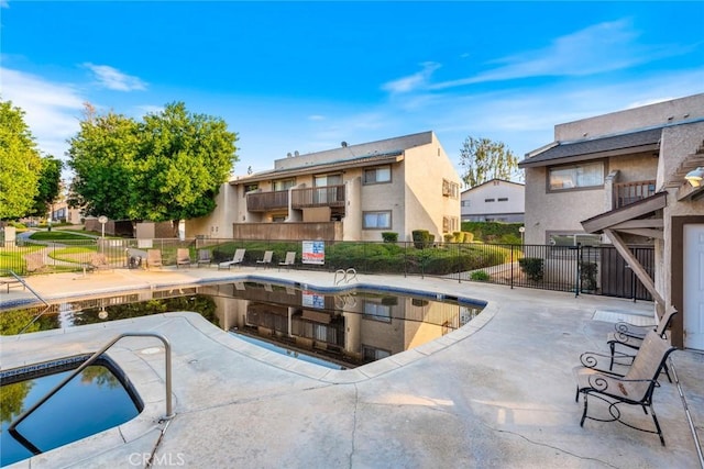 view of pool with a patio area