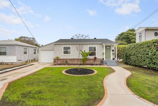 view of front facade featuring a garage and a front lawn