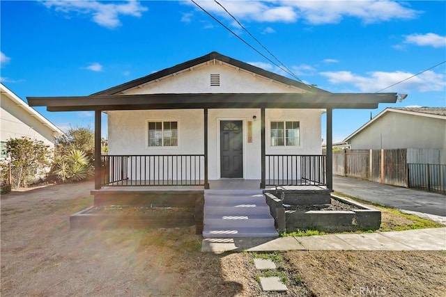 bungalow featuring covered porch