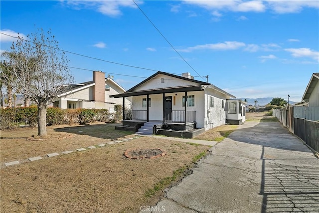 bungalow-style house featuring covered porch