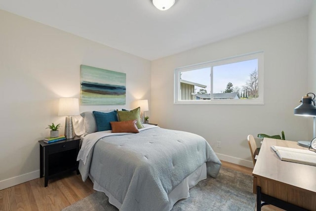 bedroom featuring hardwood / wood-style flooring