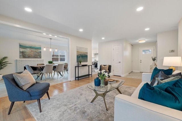 living room with light hardwood / wood-style floors