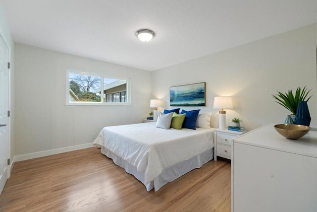 bedroom featuring light hardwood / wood-style floors