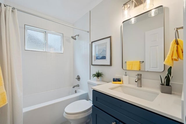 full bathroom featuring vanity, shower / bath combination with curtain, and toilet