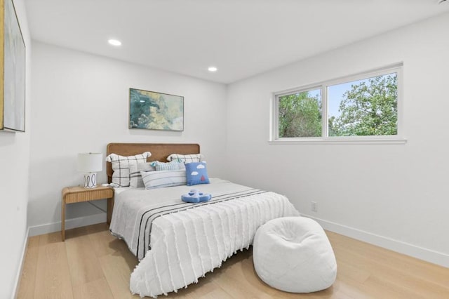 bedroom featuring wood-type flooring