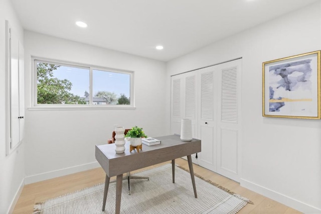 home office featuring light hardwood / wood-style floors