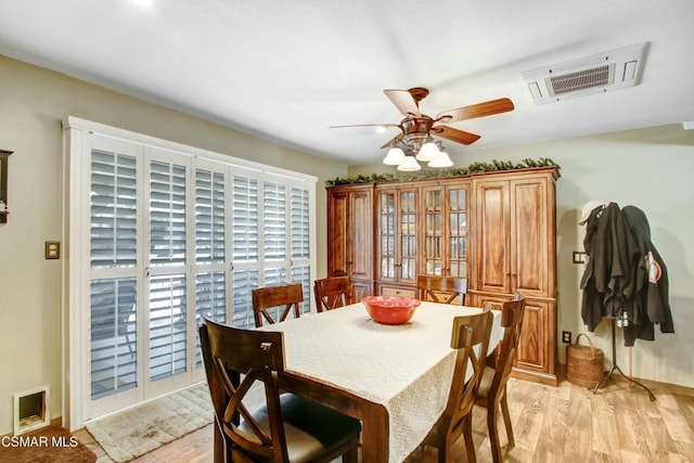 dining area featuring ceiling fan and light hardwood / wood-style floors