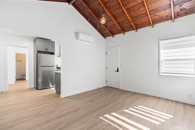 unfurnished room with light hardwood / wood-style flooring, beam ceiling, high vaulted ceiling, a wall mounted air conditioner, and wooden ceiling