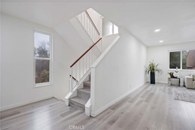 stairway with wood-type flooring