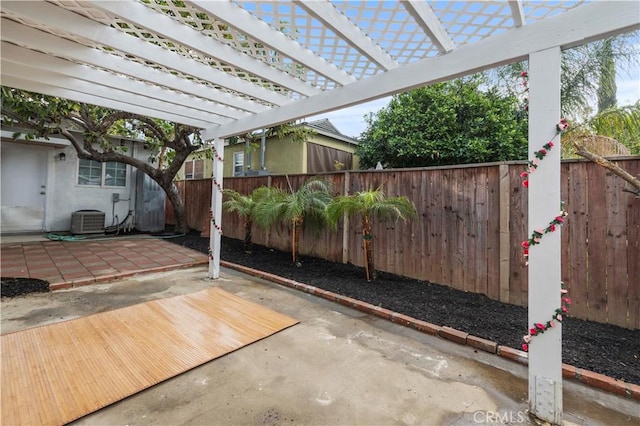 view of patio featuring central AC unit and a pergola