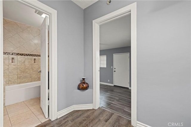 hall featuring hardwood / wood-style floors