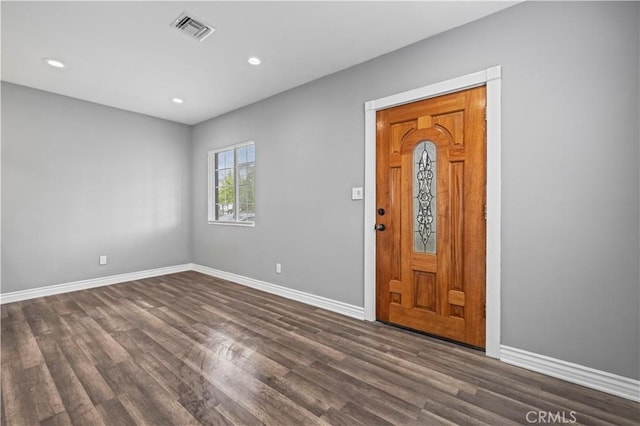 entrance foyer featuring dark wood-type flooring