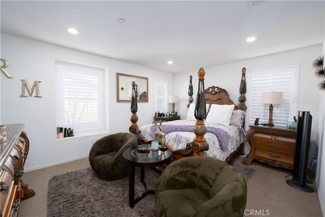 bedroom with light colored carpet