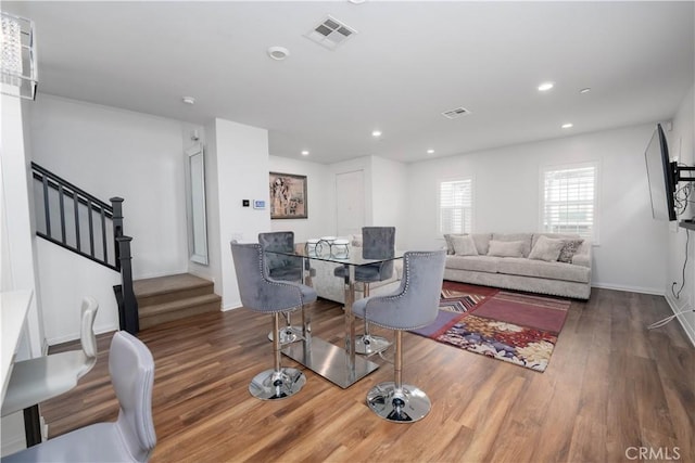 living room with dark hardwood / wood-style floors