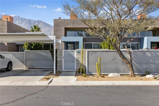 view of front of property with a mountain view