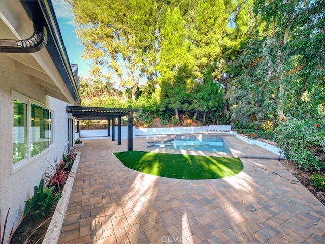 view of pool featuring a pergola and a patio area