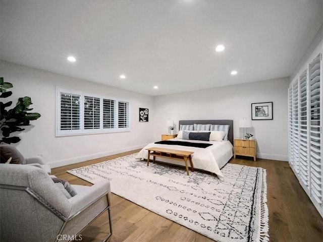 bedroom featuring wood-type flooring