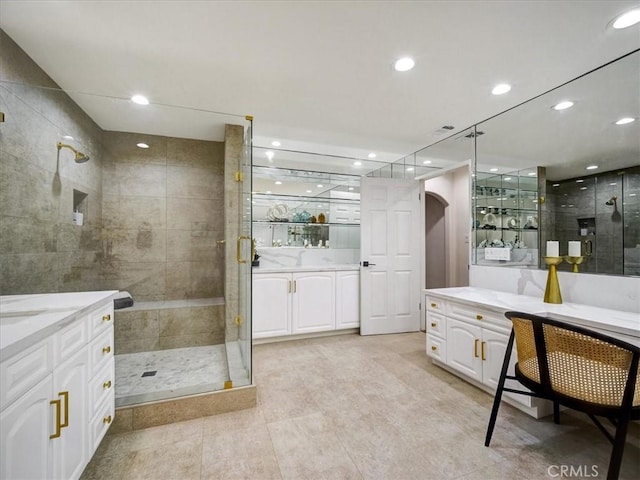 bathroom with vanity and an enclosed shower