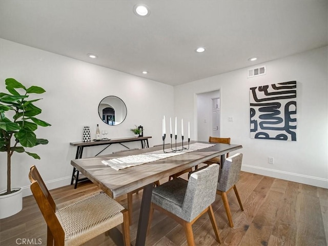 dining area featuring hardwood / wood-style floors