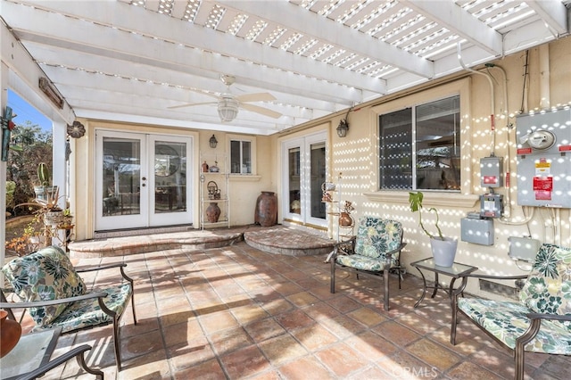 view of patio / terrace featuring a pergola and french doors