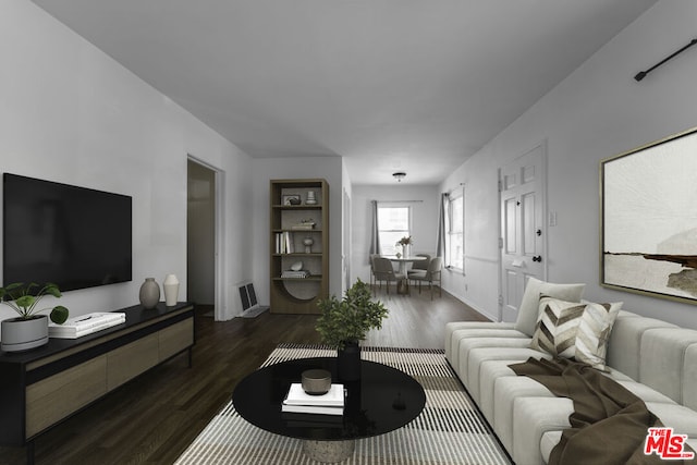 living room featuring dark hardwood / wood-style flooring