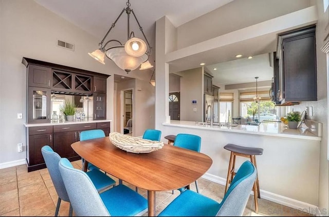 dining room with light tile patterned floors