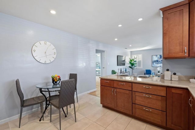 kitchen with light tile patterned floors