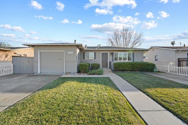 ranch-style house featuring a garage and a front lawn