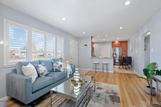 living room featuring light wood-type flooring