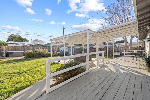 wooden terrace with a yard